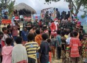 Anak-anak Pedalaman Papua Terima Bingkisan Natal dari Santa Claus Kostrad