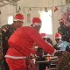 Santa Claus Yonif R 303 Kostrad Datang di Kampung Wuloni, Warnai Kejutan Natal