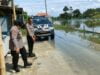 Polisi di Lamongan Keliling Kampung, Pastikan Warga Aman Dari Bencana Banjir