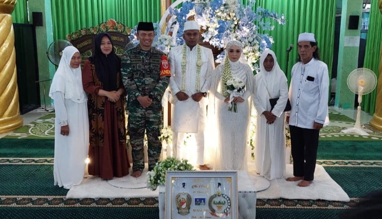 Dandim 1002/HST Jadi Saksi Akad Nikah Sertu Akri Kaunar