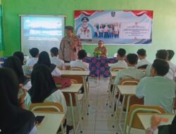 Polsek Grujugan Melaksanakan Giat Sosialisasi Kenakalan Remaja dan Bahaya Narkoba di SMKN 1 Grujugan