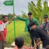KKN-PPM 11, Hibahkan Plang Lorong Untuk Gampong Teupin Banja.