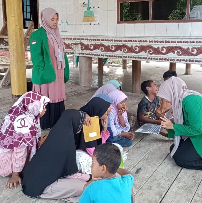 Kembangkan Literasi Anak, Mahasiswa KKN PPM Kelompok 104, Manfaatkan Digitalisasi