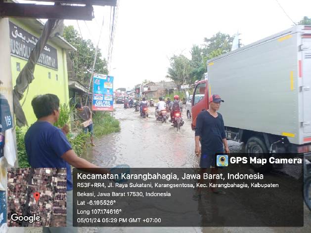 Warga Desa Karang Sentosa Keluhkan Banjir di Jalan Pilar-Sukatani