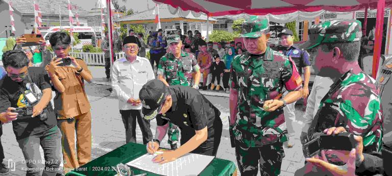 TMMD ke 119 TA 2024 Desa Karang Mukti Bangun Jalan lingkungan dan Posyandu