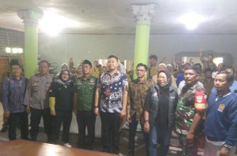 Desa Tanjung Sari sosialisasi Pilkada Serentak 2024 Kades memberikan motivasi Agar Menggunakan Hak Pilih