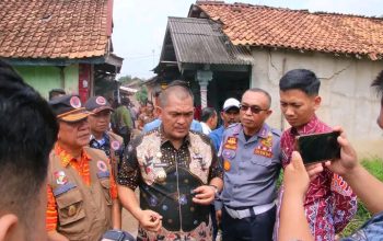 Pj , Bupati Lampung Utara  Tinjau Titik Rawan Banjir  di Kotabumi