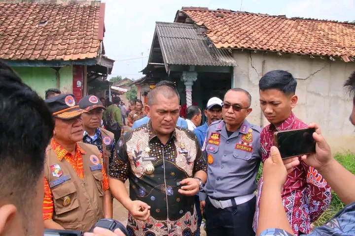 Pj , Bupati Lampung Utara Tinjau Titik Rawan Banjir di Kotabumi