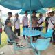 Kolaborasi DPW & DPD IWOI Jateng Bersama Polsek Semarang Barat Bagikan Bendera Merah Putih di Exit Tol Krapyak