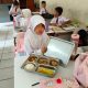 Pendistribusian Makan Gratis di Desa Jatireja, Polsek Cikarang Timur Lakukan Monitoring