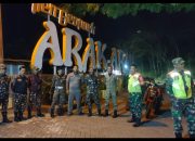 Wujud Kebersamaan, Babinsa dan Banser Menyapa Warga Lewat Patroli Malam