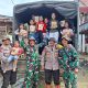 TNI & POLRI Hadir Tebar Kepedulian Bagikan Susu dari Presiden Buat Anak Anak Tapsel