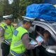 Personel Pos Pelayanan OPS Ketupat Krakatau 2026 Polres Lampung Utara Atur Arus Mudik, Imbau Pemudik Utama Kan Keselamatan