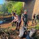 Wakapolres Lampung Utara Hadiri Gerakan Raden Inten Asri Bersihkan Sampah di Aliran Sungai Way Rarem
