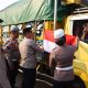 Polres Lampung Utara Bagikan 775 Bendera Merah Putih Sambut HUT Ke-81 RI