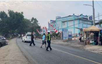 Polres Lampung Utara Tingkatkan Pelayanan, Personel Bantu Kelancaran  Lalu Lintas dan Anak Sekolah