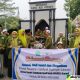 Tampilkan Ikon Menara Suar dan Gerbang Asta Adipoday, IKSASS Rayon Sapudi Meriahkan Pawai Penyambutan Alumni Se-Nusantara